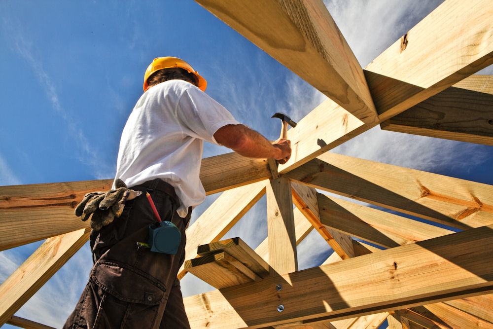 man working on fram for new construction